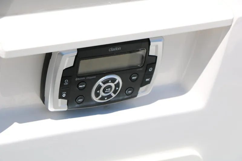 Slide: The Image of Clarion audio system on 2021 Chaparral 21 SSi Ski & Fish boat dashboard. - 39