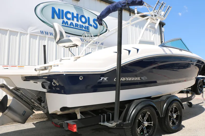 Slide: The Image of 2021 Chaparral 21 SSi Ski & Fish boat on trailer at Nichols Marine dealership. - 8