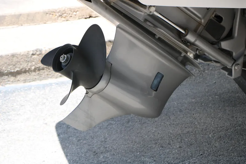 Slide: The Image of Propeller of 2021 Chaparral 21 SSi Ski & Fish boat on pavement. - 9