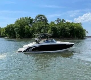 The Image of 2019 Cobalt R5 Surf boat on a calm lake. - 1