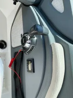 Slide: The Image of Interior view of 2019 Cobalt R5 Surf boat controls. - 15