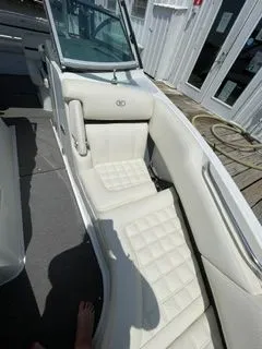 Slide: The Image of Interior of a 2019 Cobalt R5 Surf boat with white upholstery. - 20