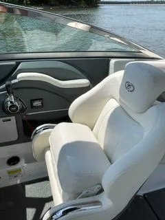 Slide: The Image of Interior of a 2019 Cobalt R5 Surf boat with white seating. - 21