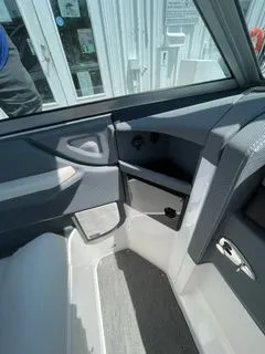 Slide: The Image of Interior of a 2019 Cobalt R5 Surf boat, gray upholstery. - 23