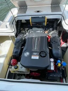 Slide: The Image of 2019 Cobalt R5 Surf engine compartment with open cover. - 28