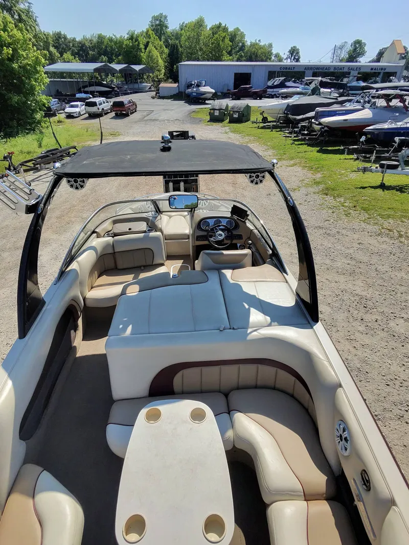 Slide: The Image of Interior of a 2005 Malibu XTI boat at a boatyard. - 4