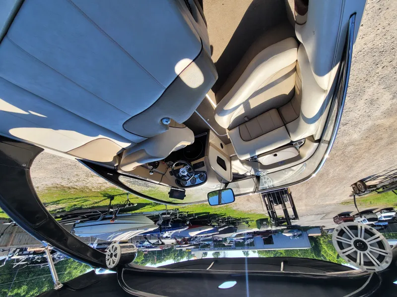 Slide: The Image of Interior of a 2005 Malibu XTI boat with leather seats. - 7