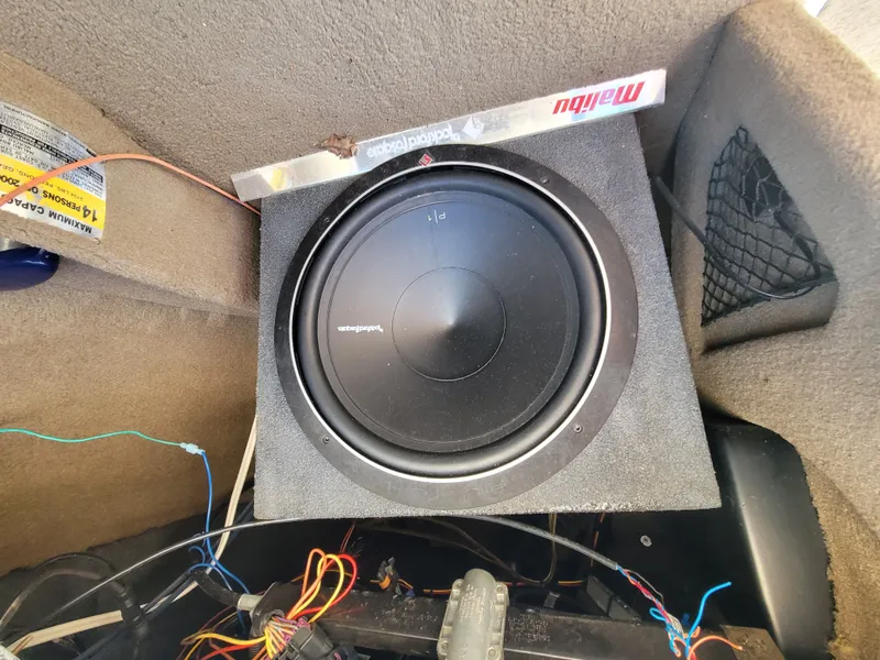 Slide: The Image of Rockford Fosgate subwoofer in a 2005 Malibu XTI boat. - 9
