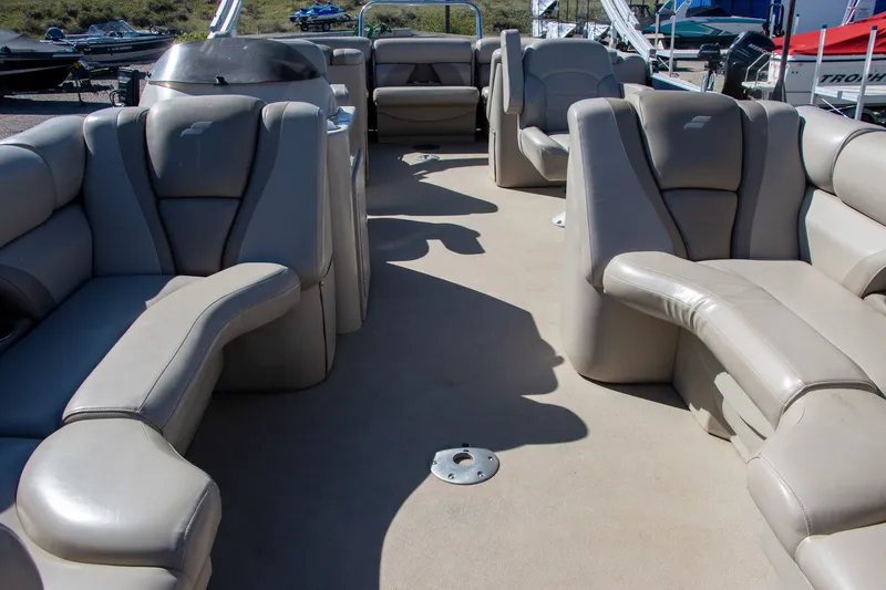 Slide: The Image of Interior of a 2017 Starcraft EX23 R pontoon boat with gray seating. - 5