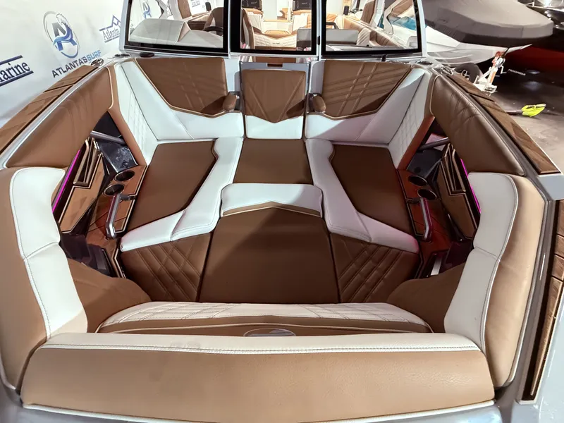 Slide: The Image of 2024 Tigé Ultré 23ZX interior with luxurious seating. - 13