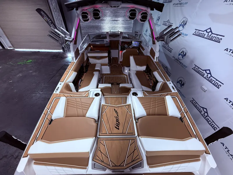 Slide: The Image of Interior view of 2024 Tigé Ultré 23ZX boat with luxurious seating. - 25
