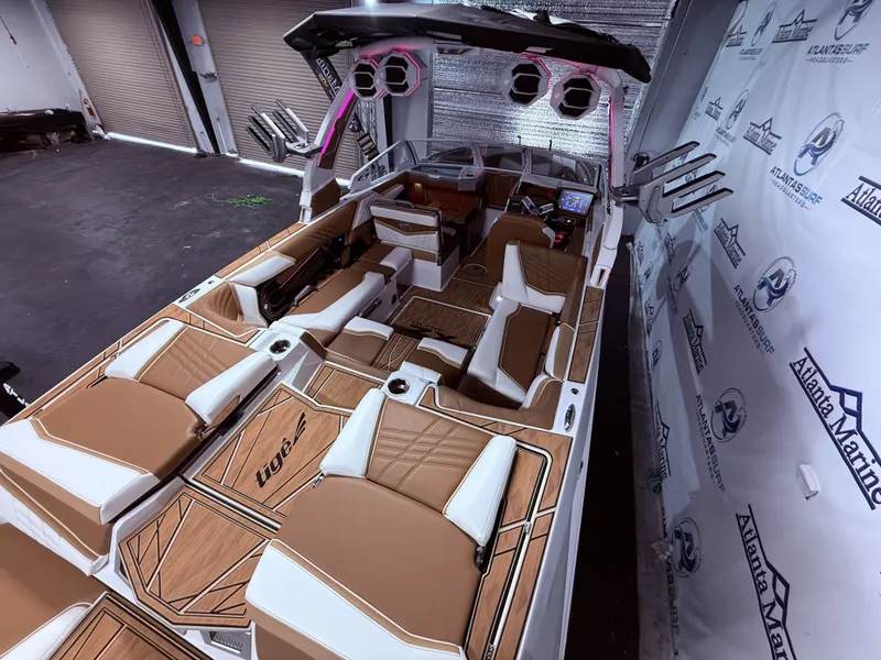 Slide: The Image of Interior of 2024 Tigé Ultré 23ZX boat with luxurious features. - 27