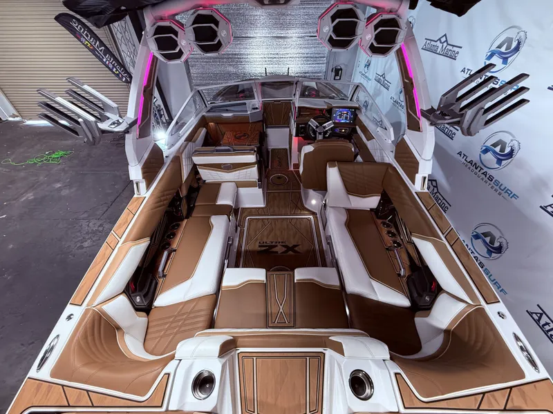 Slide: The Image of Interior of 2024 Tigé Ultré 23ZX boat with luxurious features. - 30