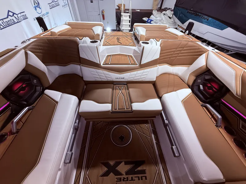 Slide: The Image of Interior of 2024 Tigé Ultré 23ZX with luxurious seating. - 33