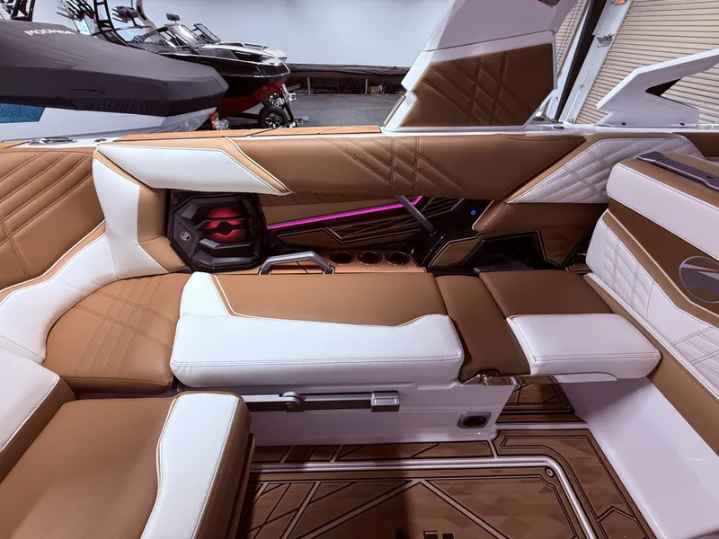 Slide: The Image of Interior of 2024 Tigé Ultré 23ZX with luxurious seating. - 34