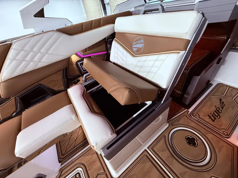 Slide: The Image of Interior of 2024 Tigé Ultré 23ZX with luxurious seating. - 37