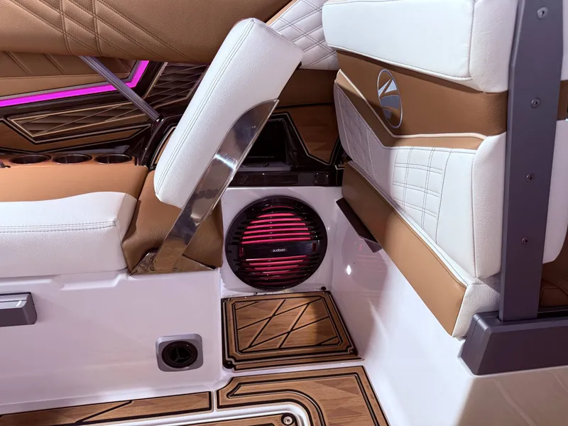 Slide: The Image of 2024 Tigé Ultré 23ZX interior with luxurious seating and speaker. - 39