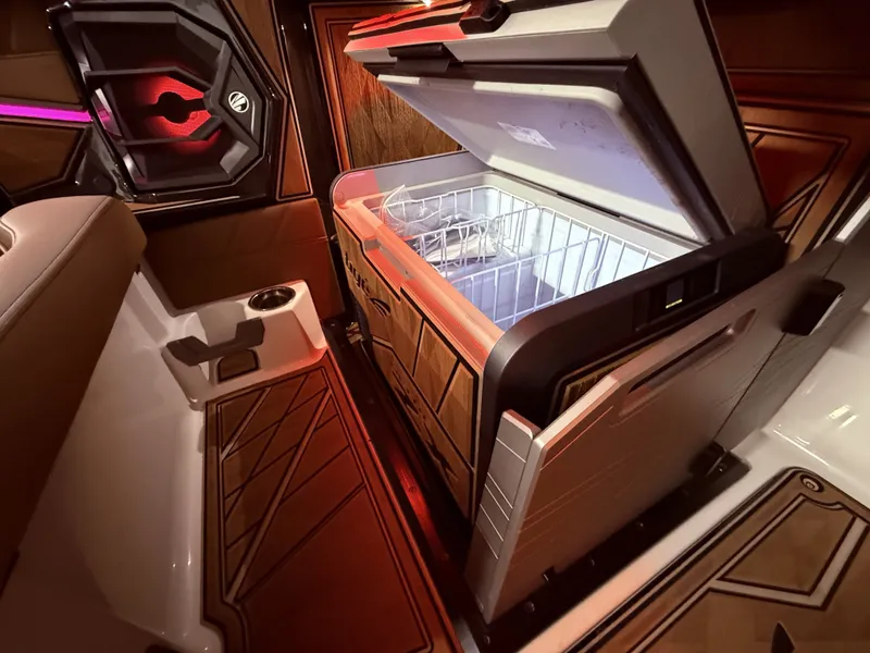 Slide: The Image of Interior of 2024 Tigé Ultré 23ZX with open refrigerator. - 44