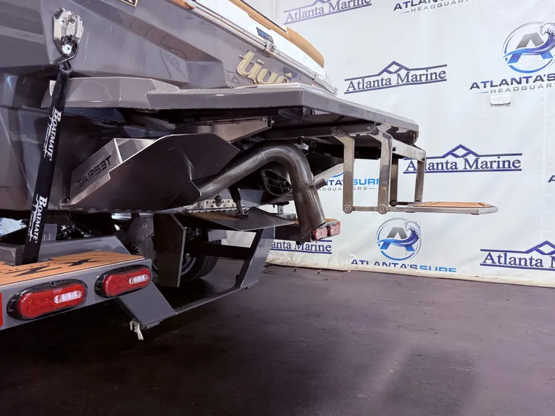 Slide: The Image of Rear view of 2024 Tigé Ultré 23ZX boat at Atlanta Marine. - 5