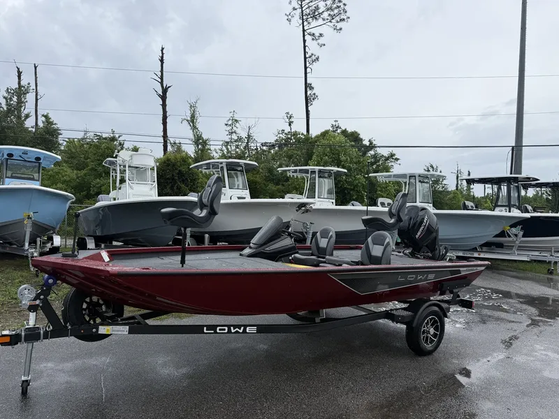 The Image of 2026 Lowe Stinger ST175 boat on trailer outdoors. - 1