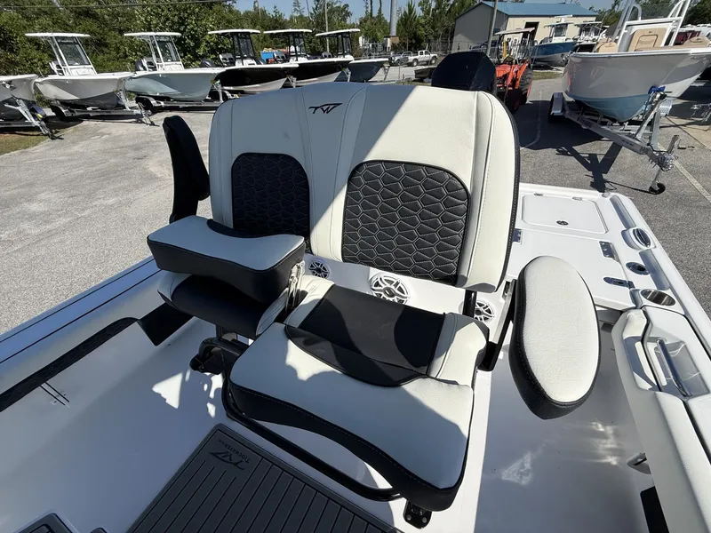 Slide: The Image of 2026 Tidewater 2500 Carolina Bay boat seats outdoors. - 12