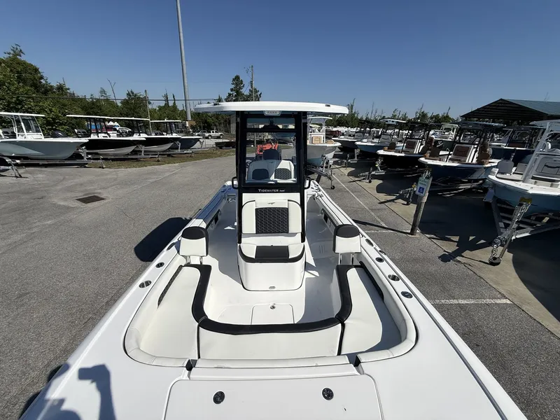 Slide: The Image of 2026 Tidewater 2500 Carolina Bay boat in a parking lot. - 9