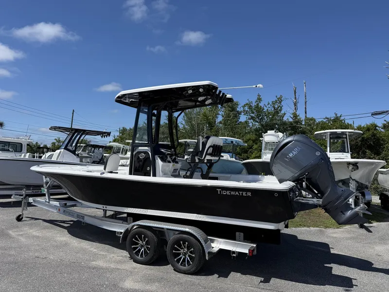 Slide: The Image of 2026 Tidewater 2210 Carolina Bay boat on trailer, side view. - 2