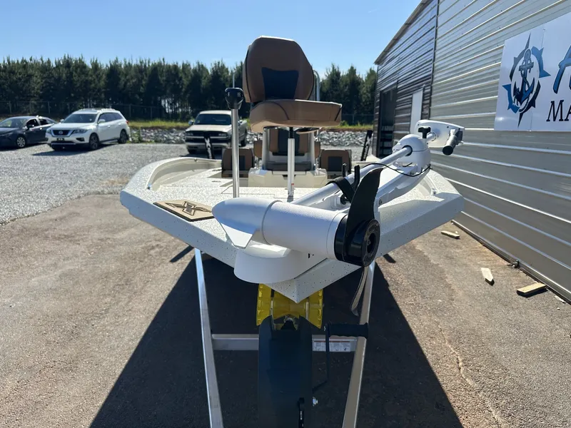 Slide: The Image of 2026 Xpress Hyper-Lift Bay Series H22B boat in parking lot. - 2