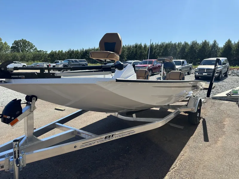 Slide: The Image of 2026 Xpress H18 Bass boat on trailer outdoors. - 3