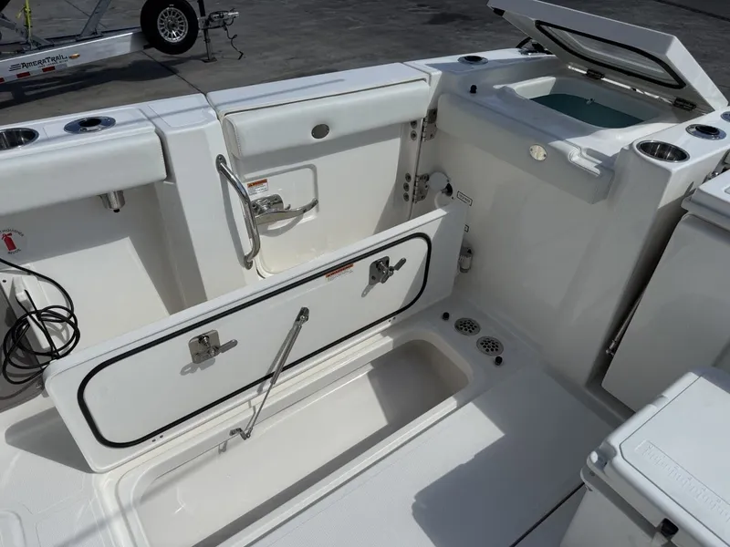 Slide: The Image of Interior view of 2026 Pursuit S 358 Sport with storage compartments. - 11