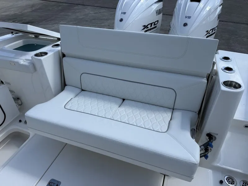 Slide: The Image of 2026 Pursuit S 358 Sport boat with luxurious white seating. - 13
