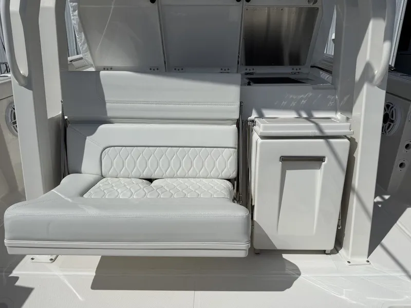 Slide: The Image of Interior of 2026 Pursuit S 358 Sport with white seating area. - 22