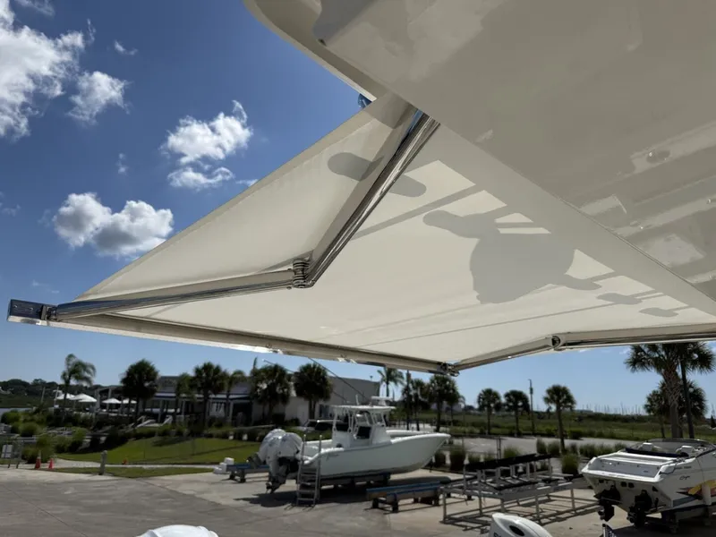 Slide: The Image of Sunshade on Pursuit S 358 Sport boat, 2026 model. - 25