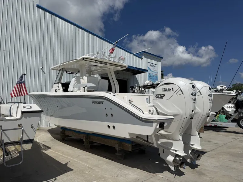 Slide: The Image of 2026 Pursuit S 358 Sport boat with Yamaha engines outdoors. - 5