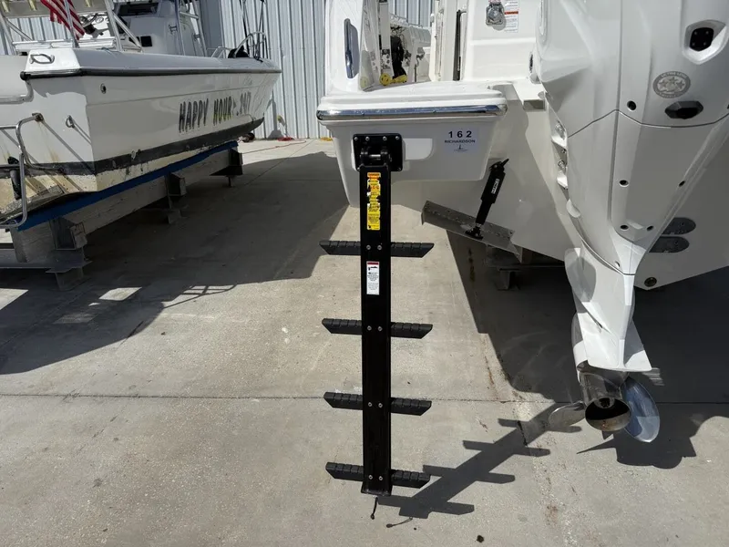 Slide: The Image of Ladder on the stern of a 2026 Pursuit S 358 Sport boat. - 9