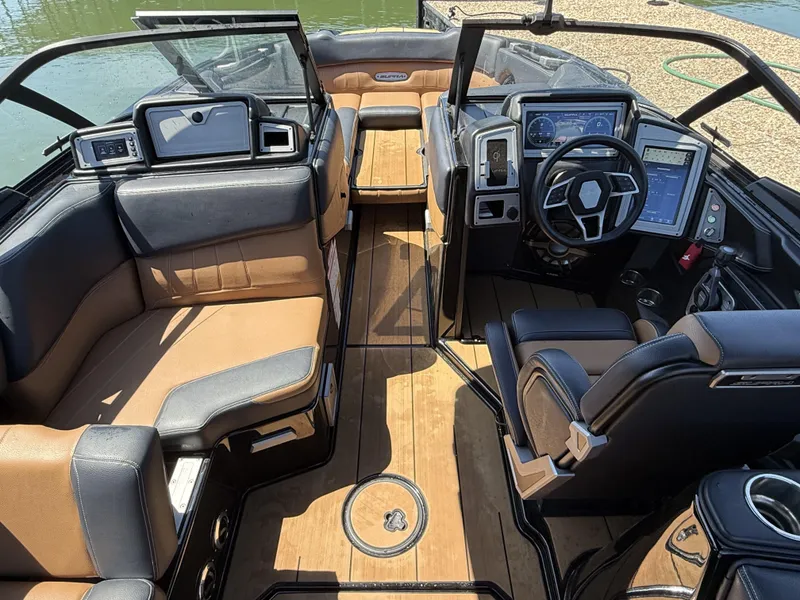 Slide: The Image of Interior of a 2021 Supra SE 550 boat with luxurious features. - 15