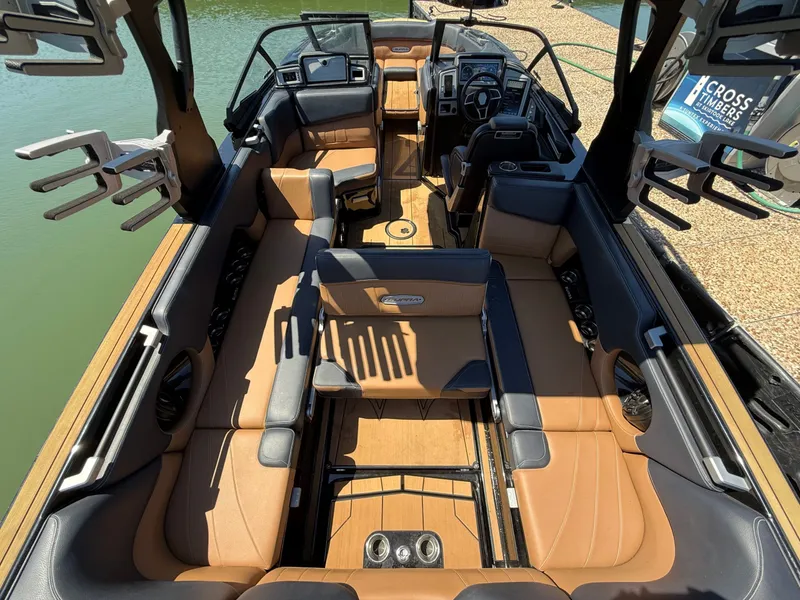 Slide: The Image of Interior of a 2021 Supra SE 550 boat with luxurious seating. - 21