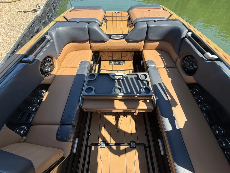Slide: The Image of Interior of a 2021 Supra SE 550 boat with luxurious seating. - 28