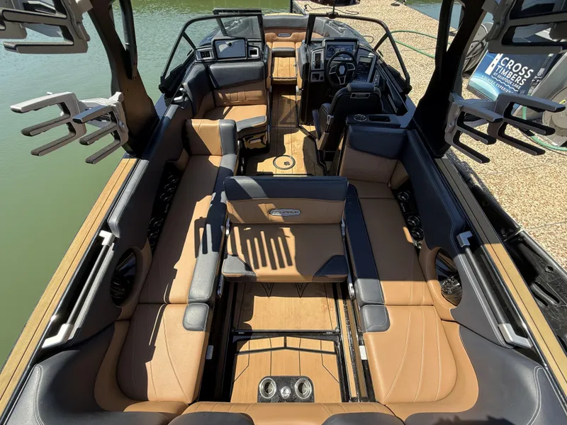 Slide: The Image of Interior of a 2021 Supra SE 550 boat with luxurious seating. - 7
