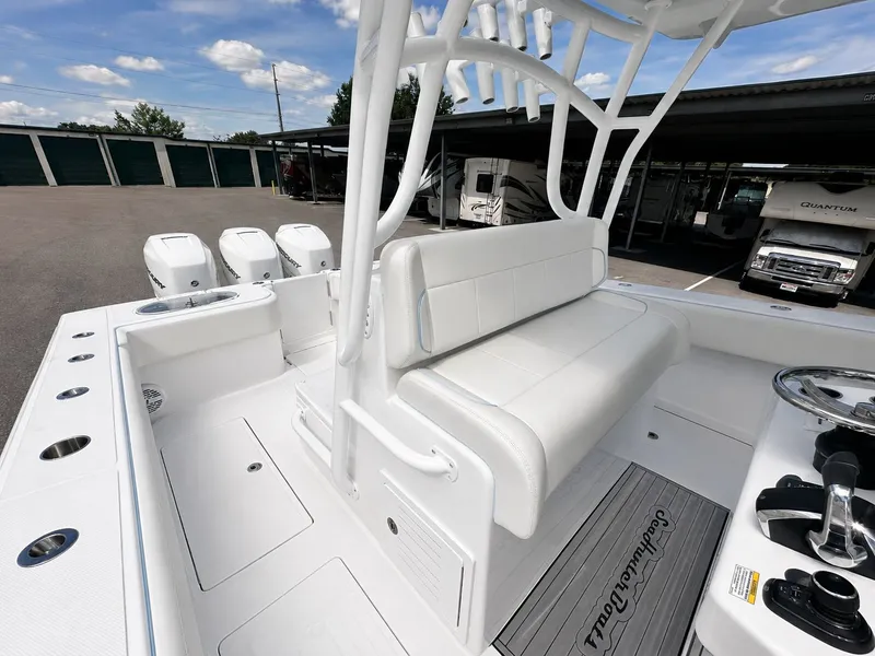 Slide: The Image of 2023 SeaHunter Tournament boat with luxurious interior and engines. - 15