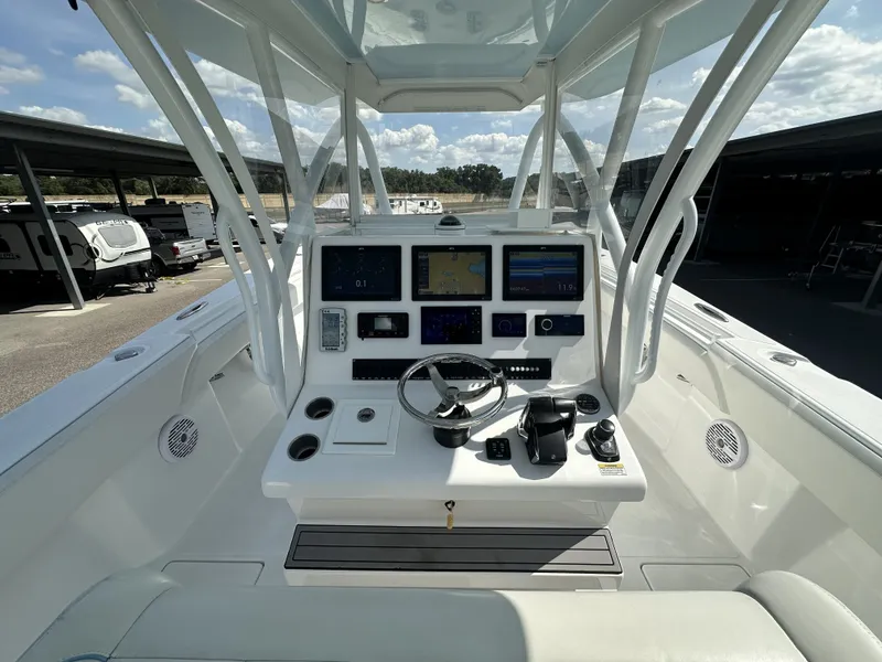 Slide: The Image of 2023 SeaHunter Tournament boat console with modern electronics. - 16