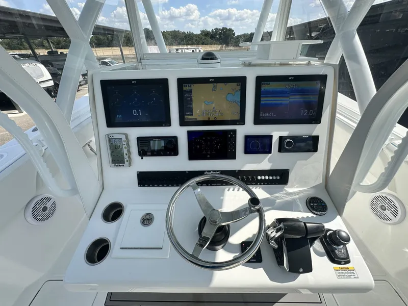 Slide: The Image of 2023 SeaHunter Tournament boat console with advanced navigation systems. - 17