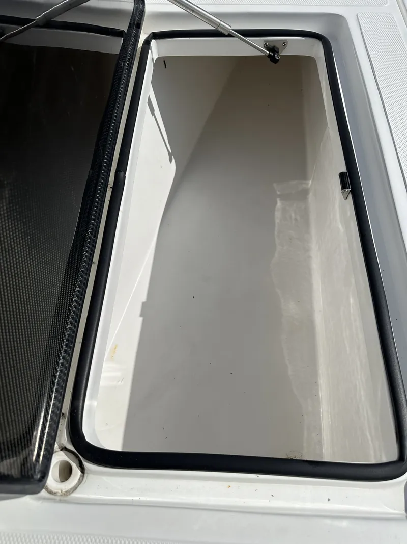 Slide: The Image of Open storage compartment in 2023 SeaHunter Tournament boat. - 24