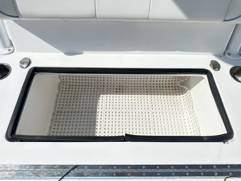 Slide: The Image of 2023 SeaHunter Tournament boat with open storage compartment. - 27