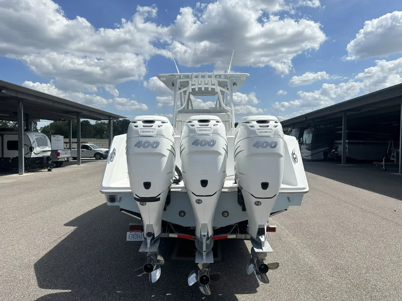 Slide: The Image of 2023 SeaHunter Tournament boat with triple outboard engines. - 6