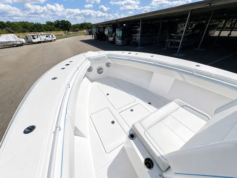 Slide: The Image of 2023 SeaHunter Tournament boat with spacious deck and seating area. - 8