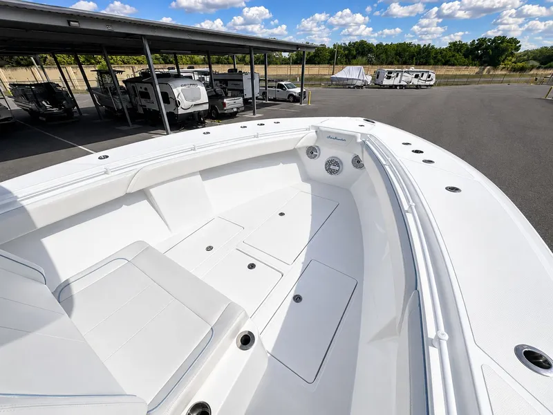 Slide: The Image of 2023 SeaHunter Tournament boat with spacious deck and seating area. - 9