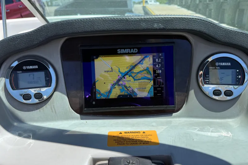 Slide: The Image of Dashboard of 2019 Chaparral 21 H2O Sport OB with Simrad navigation display. - 22