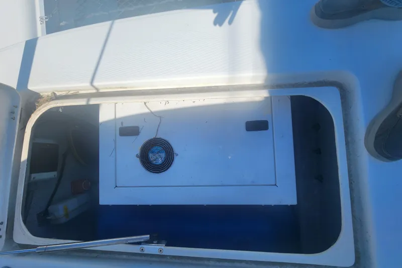 Slide: The Image of Open storage compartment on a 2019 Lagoon 380 catamaran deck. - 34