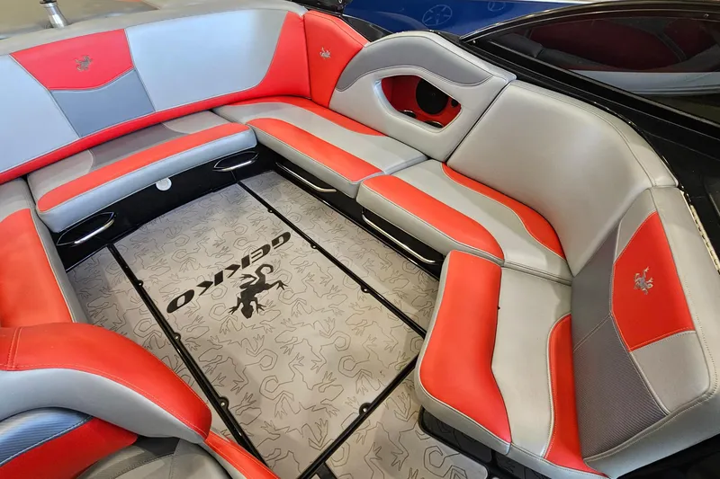 Slide: The Image of Luxurious interior of 2017 Gekko Revo 7.1 boat with red and gray seating. - 11